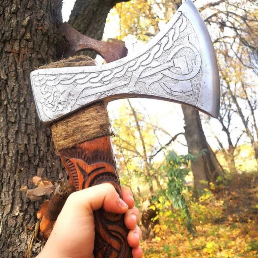 Engraved birch wood and steel viking axe